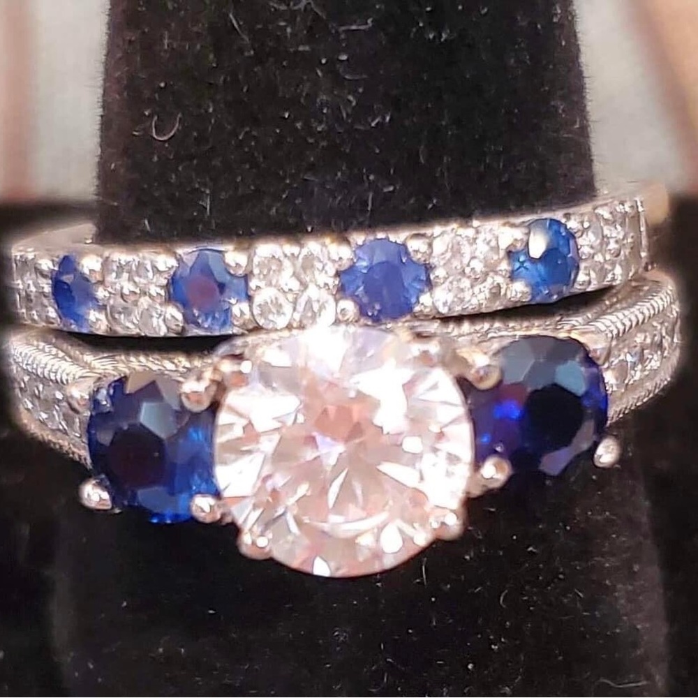 Size 8. Like new. Mostly sterling silver, lab-created sapphires/diamonds.